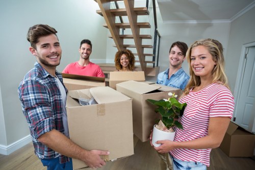 Packed boxes and furniture ready for transport