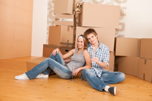 Boxes and furniture being transported by a van service in Bromley