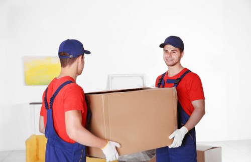 Loading furniture into a moving van for a Bromley removal