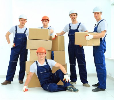 Packed moving boxes and wrapped furniture ready for a Bromley home relocation