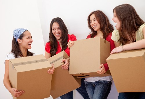 Team collecting bedroom furniture from a Bromley property