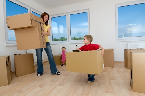 Packed moving boxes and household items prepared for transport in Bromley