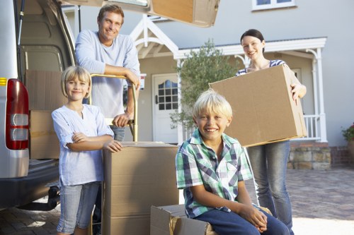 Packed boxes and moving trolley ready for a Bromley man and van service