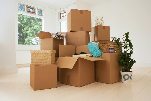 Removals crew planning a house move in Bromley near residential streets