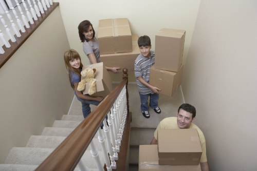Local moving truck loading furniture and boxes in Bromley